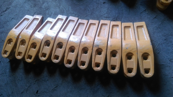 Зуб ковша центральный LW500, ZL50G , LG953 / 956 / 952